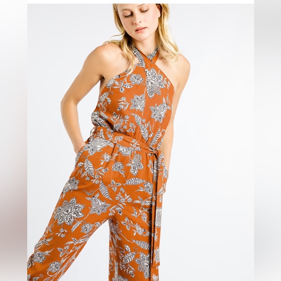 lanidor Pants - Floral print jumpsuit  
Tie fastening at the neck  
Cutout back  
Halter neck